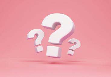 A pink background with three white question marks.