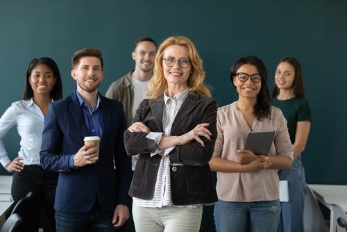 A group of people standing next to each other.