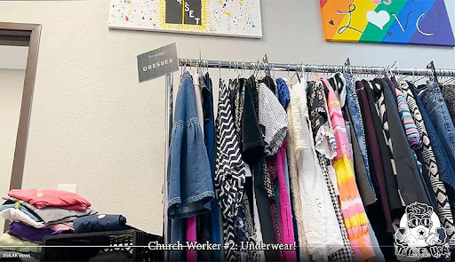 A rack of clothes hanging on the wall.