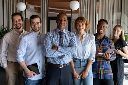 A group of people standing next to each other.