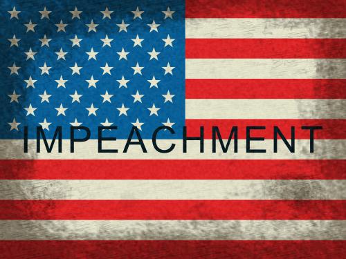 A flag with the word impeachment written underneath it.