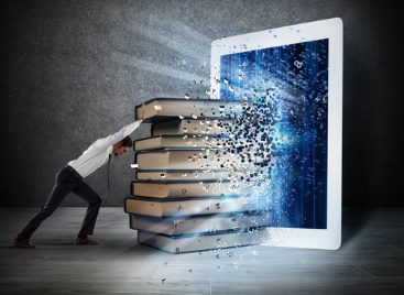 A person is pushing books into the air